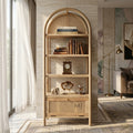modern cane display shelf with books and decor