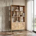 Wooden bookshelf with decorative items against a stone wall