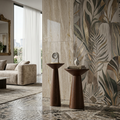 Decorative elements in a living room with a patterned wall and wooden stands.