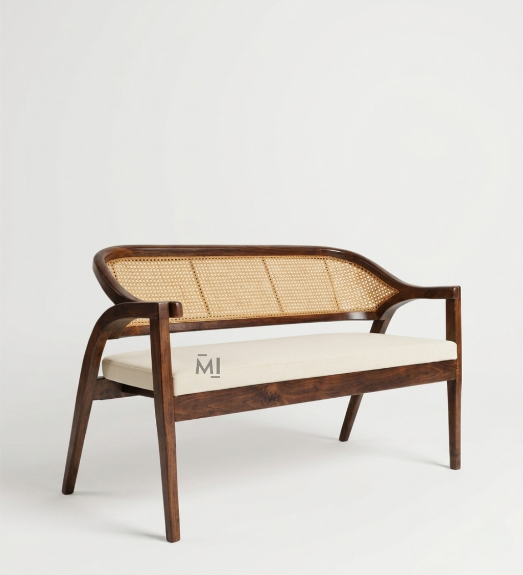 Wooden bench with wicker backrest and white cushion on a light gray background