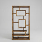 Wooden bookshelf with geometric design on a gray background