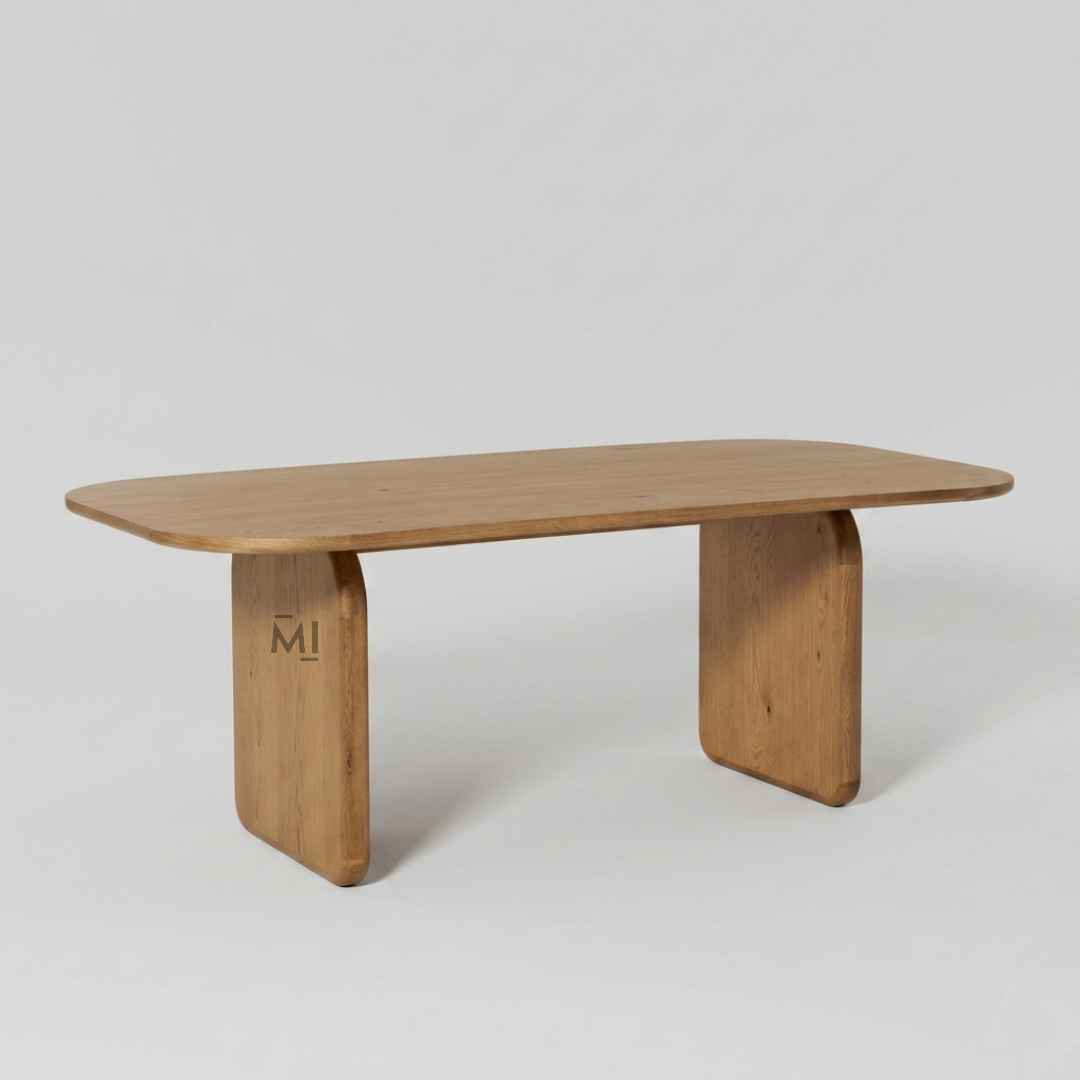 Sculpted solid wood dining table with rounded pedestal legs