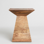 Wooden pedestal table on a white background