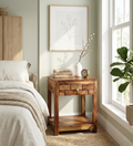 Modern solid wood bedside table with geometric drawer design and open shelf beside a contemporary bedroom bed
