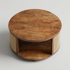 Round wooden side table with wicker accents on a light gray background
